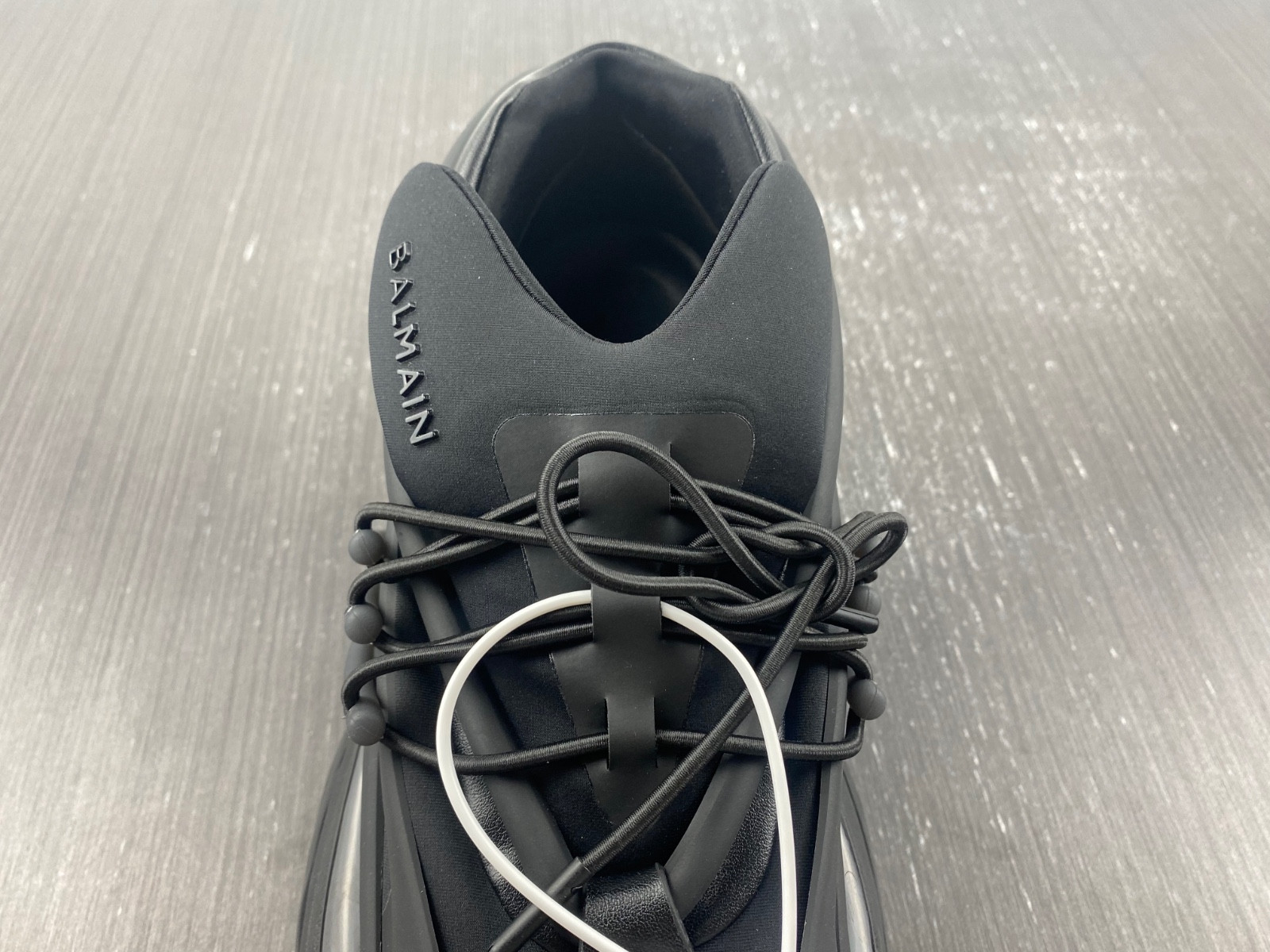 BALMAIN NEOPRENE AND LEATHER UNICORN LOW-TOP SNEAKERS